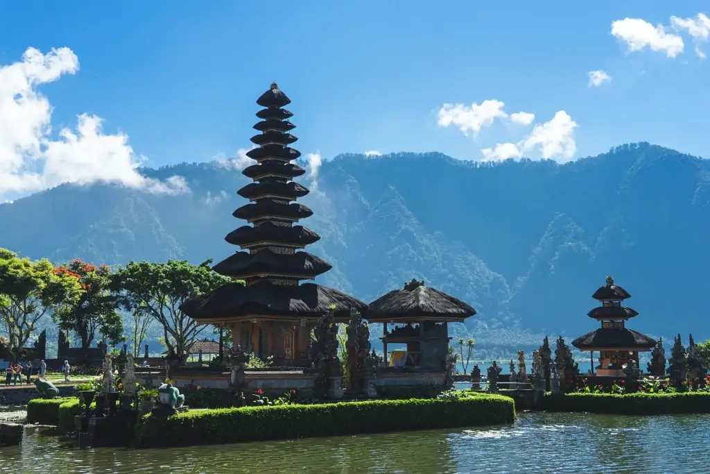 Balinese temple beside calm water