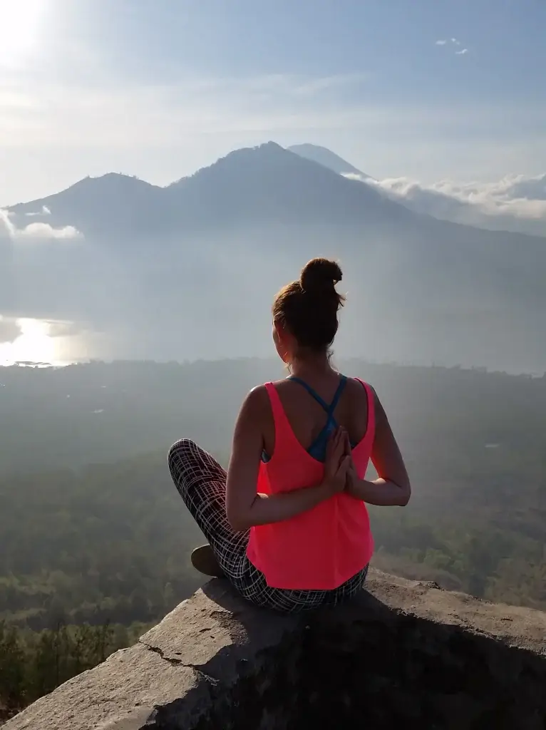 Kuta bali yoga at the top of mountain batur bali