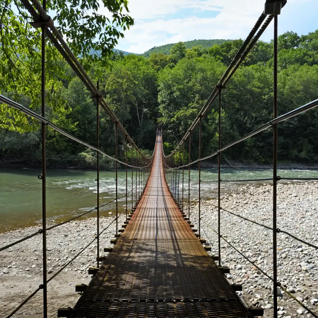 North bali suspension bridge through river belaya in republic