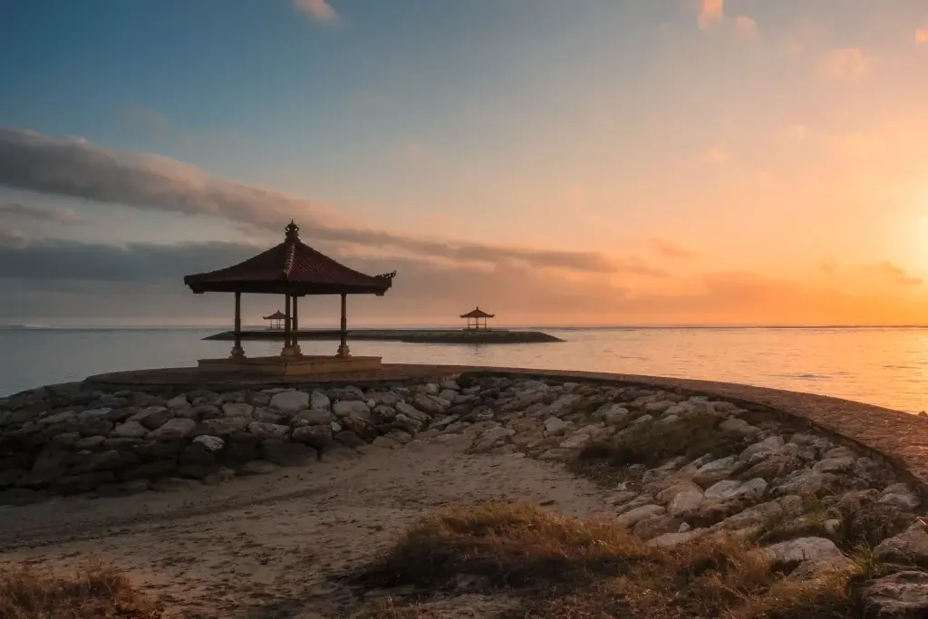 Sanur bali beach bali pavilion on jetty at coastline in morning