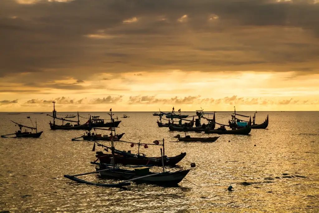 Sanur bali beach sunset on the beach of jimbaran bali